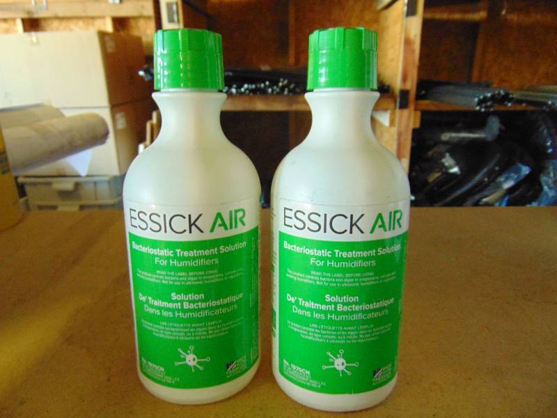 lot 7069 image: (2) bottles Essick Air treatment Solution for humidifiers, 32 ox bottles