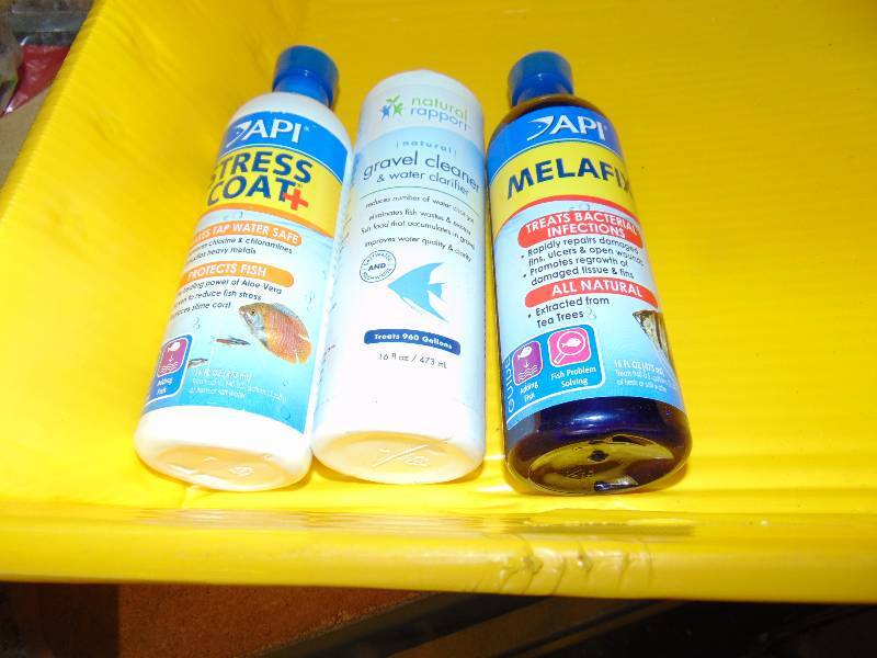 lot 7081 image: (3) ct. mixed lot Aquarium supplies (1) API Stress coat plus, 16 oz., (1) API Melafix, 16 oz., (1) Natural rapport gravel Cleaner, 16 oz.
