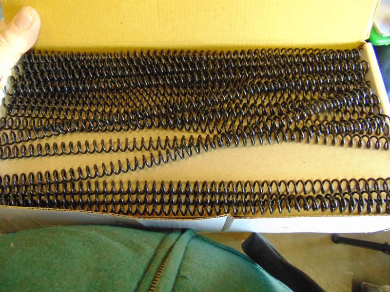 lot 7102 image: (1) box Spiral Plastic Coil, 8 mm (516)x 12, (100) pieces per box, black