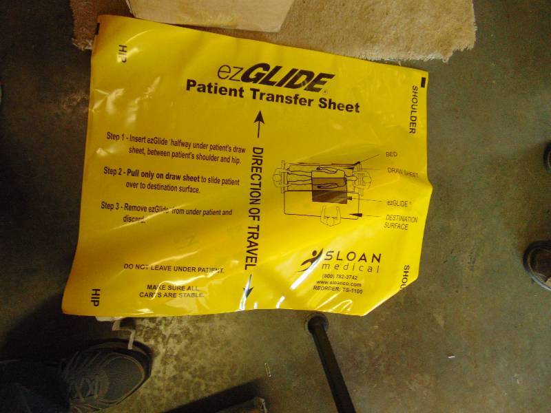 lot 7104 image: (1) box EZ Glide Patient transfer sheets, 24 x 30, approx 25 per box