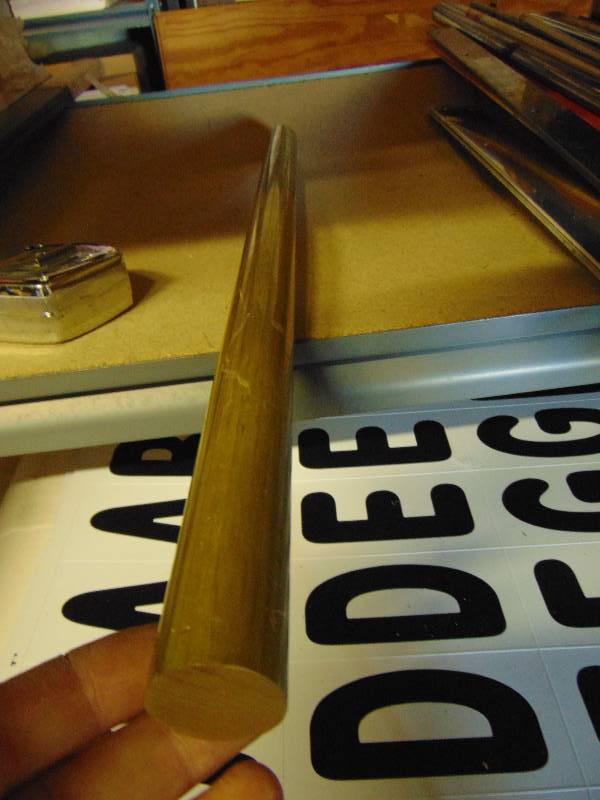 lot 7185 image: (1) piece brass round bar stock, 24 x 1-14 diameter