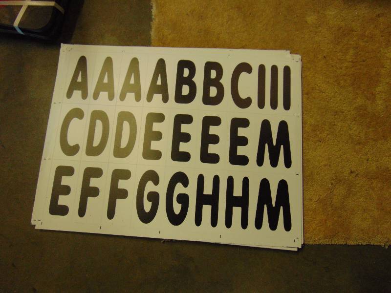 lot 7194 image: (16) sheets 6 letters, numbers and punctuation for use with sign boards- not included