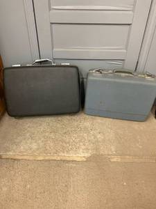 lot 1870 image: Vintage suitcase lot Black one is American tourist we and the blue is Forecaster