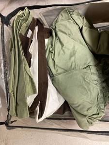 lot 1881 image: Sheets, bed skirt, 1 throw pillow. unknown size. green and brown.