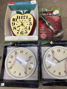 lot 1909 image: Clock lot and ESPN Hole in one swing simulator