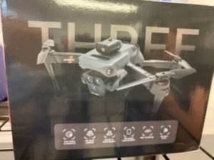 lot 2318 image: K6 Drone four sides, avoidance, 4K, dual camera, hover at fixed height, HD image transmission, 360° tumbling, foldable body.