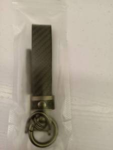 lot 44212 image: TURCEE LEATHER CAR KEYCHAIN