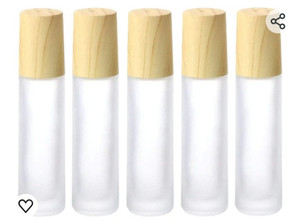 lot 44484 image: Essential Oil Roller Bottles,5 Pack 10ml Colorful Frosted Glass Roller Bottles with Stainless Steel Roller Balls,Wood Grain Lid Perfume Roll on Bottles Lip Balms Container (White frosted