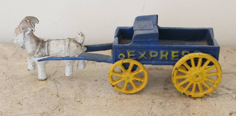 lot 7390 image: Goat Drawn Wagon Cast Iron DecorToy- Wheels Even Turn Cool