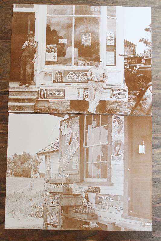 lot 7396 image: 2 Black and White Photo Prints Depicting Coca Cola and Tobacco Ads- 14 x 11- Cool