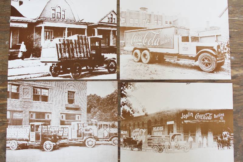 lot 7402 image: 4 Black and White Photo Prints Depicting Coca Cola Delivery Trucks- 14 x 11- Neat