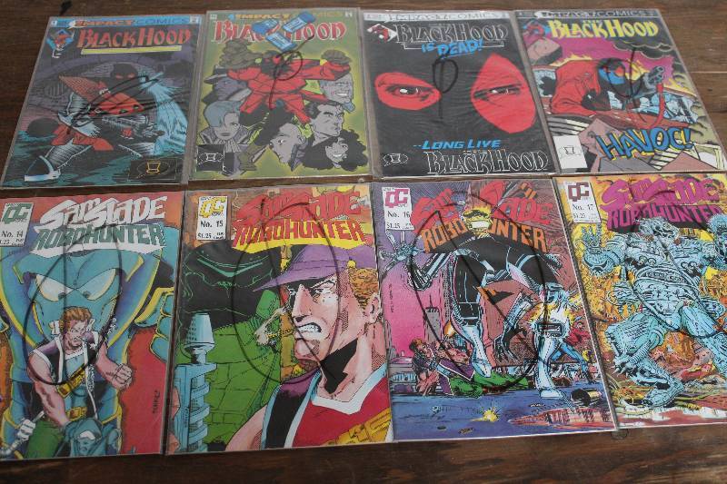lot 7412 image: Lot of 8 Comic Books- 4 Black Hood and 4 Sam Slade Robohunter- Cool