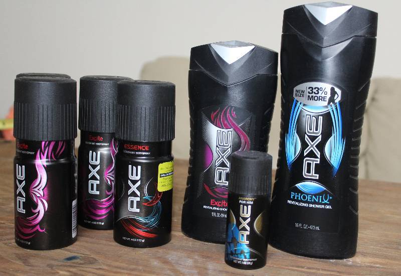 lot 7423 image: 7 Containers of AXE Deodorant, Body Spray, and Shower Gel