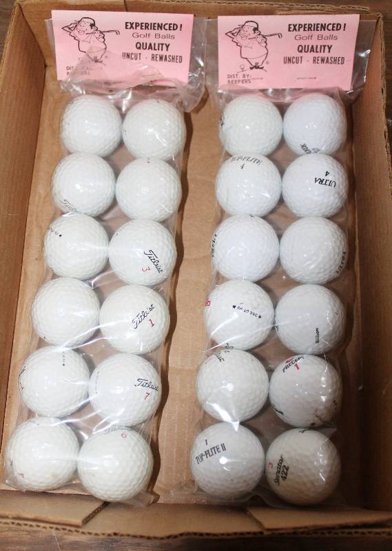 lot 7445 image: 2 Dozen Experienced Golf Balls- Uncut and Rewashed- 1 Dozen in Each Sleeve