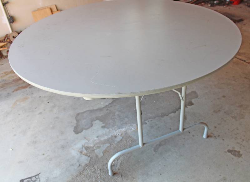 lot 7487 image: 5 Foot Folding Banquet Table- Perfect for a Family Get Together