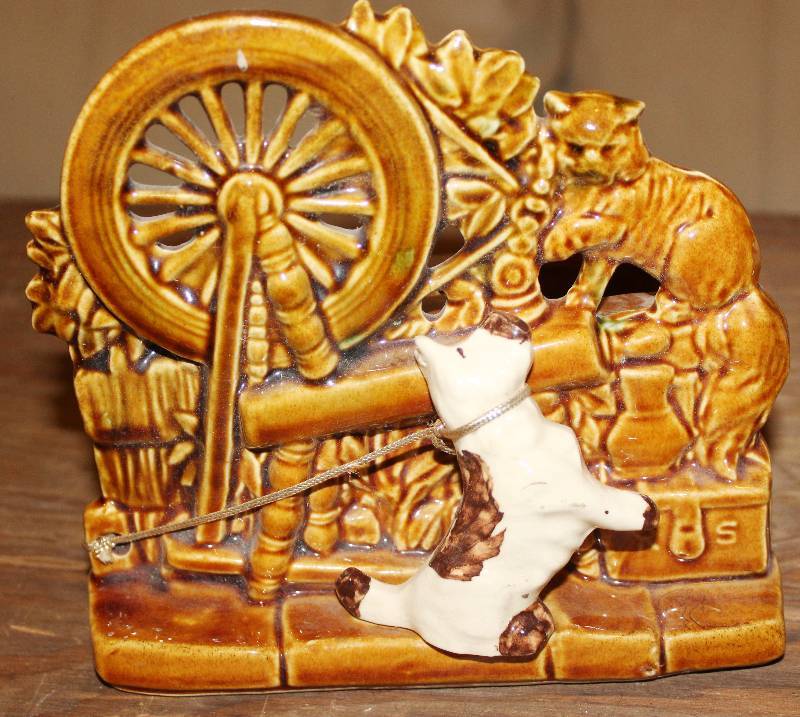 lot 7569 image: Vintage McCoy Pottery Spinning Wheel Planter w Dog and Cat- Very Neat