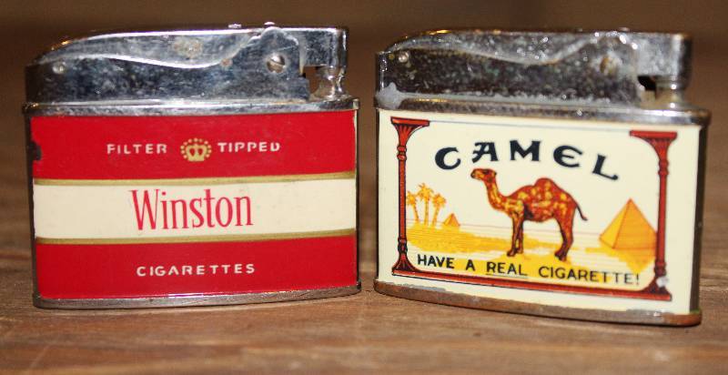 lot 7582 image: 2 Cigarette Lighters- Very Unique