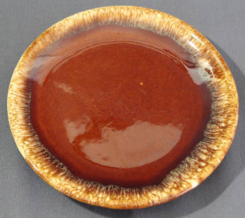 lot 9764 image: Vintage 7 Hull Brown Drip Glaze Pottery Plate.