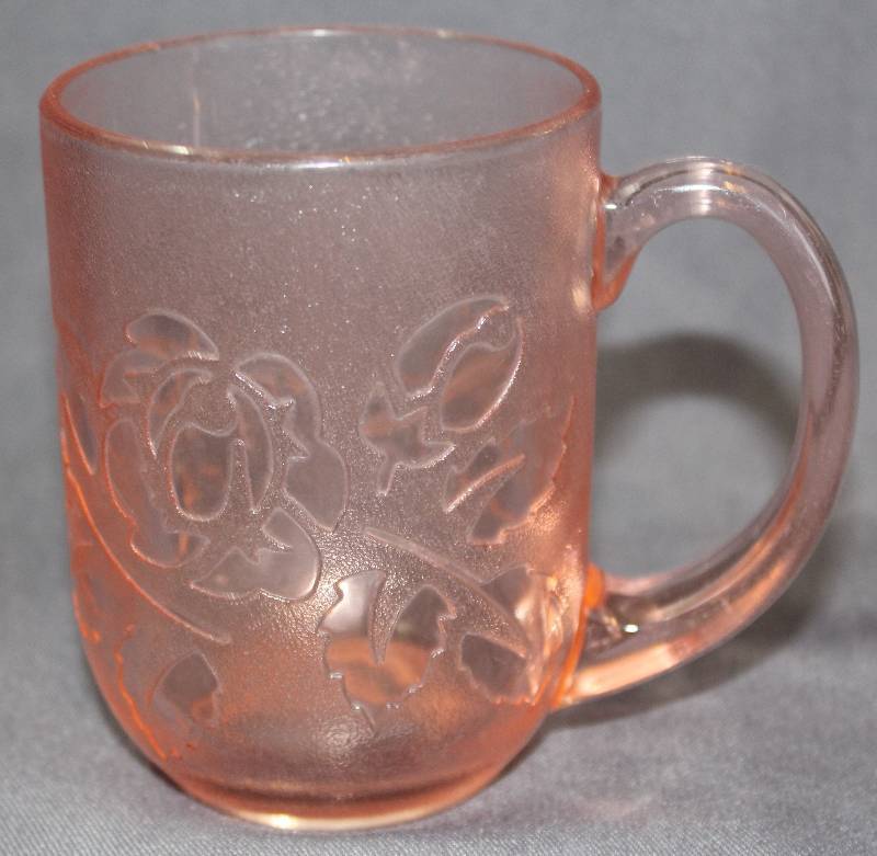 lot 9768 image: Arcoroc France Textured Glass Mug with Raised Rose Pink Rosaline.