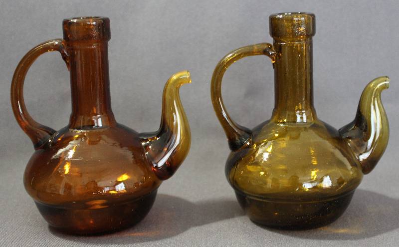 lot 9771 image: Handblown Oil & Vinegar Cruet Set Amber Glass.