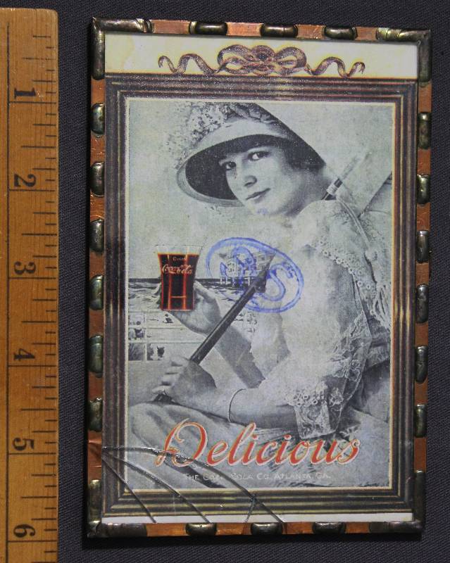 lot 9780 image: Vintage Cola-Cola Advertisement inside Soldered Copper Frame.