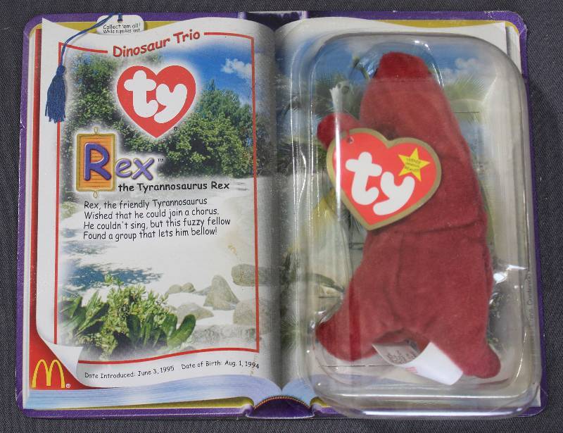 lot 9829 image: 2000 McDonalds Happy Meal Toys � Dinosaur Trio Rex Teenie Beanie. Original Pkg