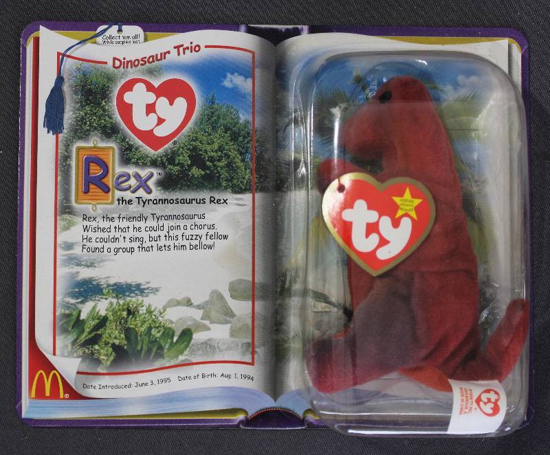 lot 9833 image: 2000 McDonalds Happy Meal Toys � Dinosaur Trio Rex Teenie Beanie. Original Pkg