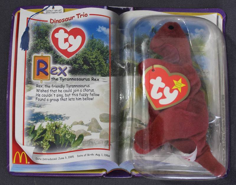 lot 9835 image: 2000 McDonalds Happy Meal Toys � Dinosaur Trio Rex Teenie Beanie. Original Pkg