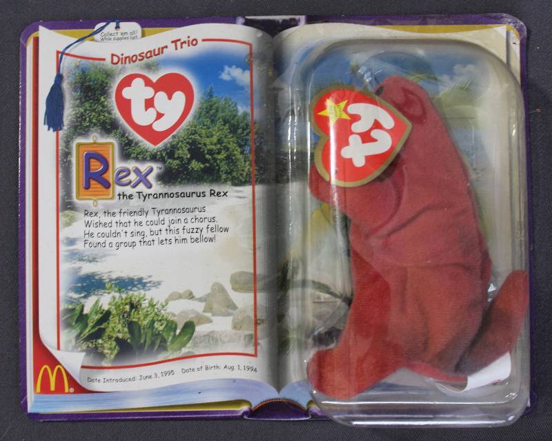 lot 9837 image: 2000 McDonalds Happy Meal Toys � Dinosaur Trio Rex Teenie Beanie. Original Pkg
