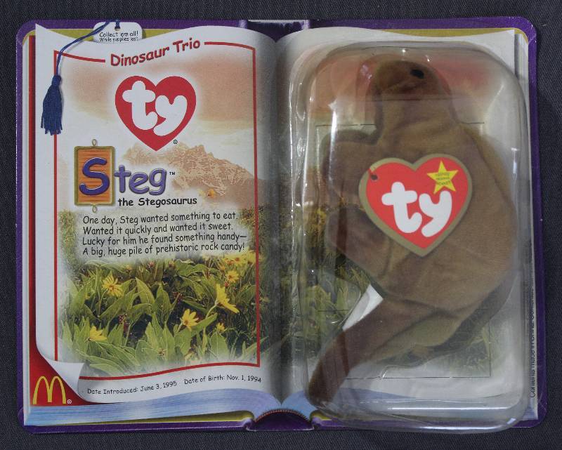 lot 9838 image: 2000 McDonalds Happy Meal Toys � Dinosaur Trio Steg Teenie Beanie. Original Pkg