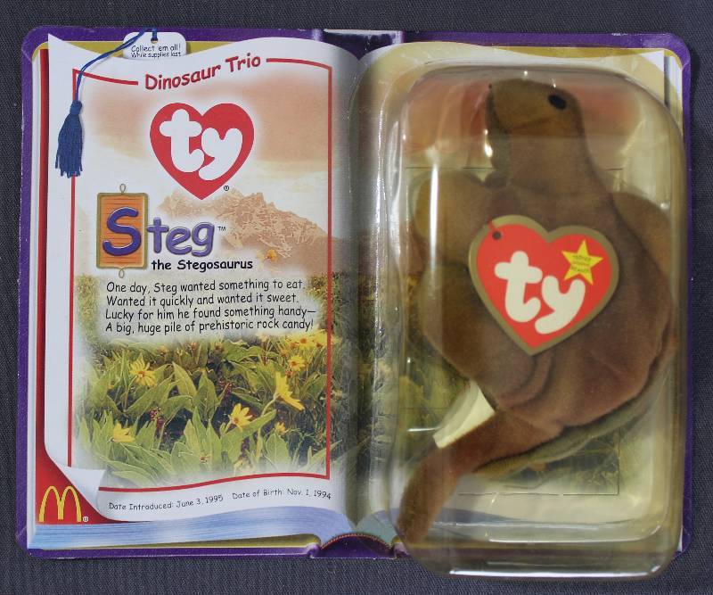 lot 9841 image: 2000 McDonalds Happy Meal Toys � Dinosaur Trio Steg Teenie Beanie. Original Pkg