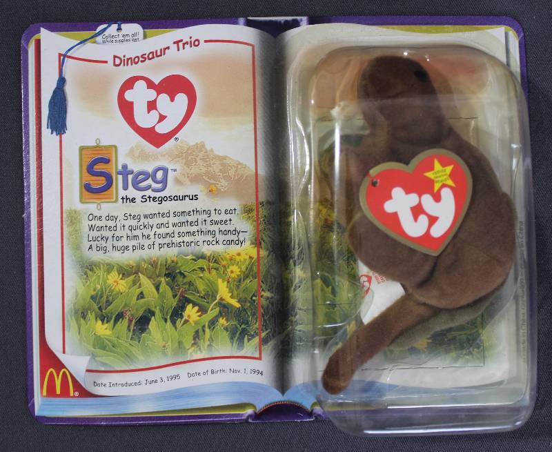 lot 9842 image: 2000 McDonalds Happy Meal Toys � Dinosaur Trio Steg Teenie Beanie. Original Pkg