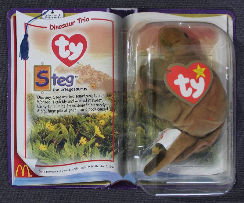 lot 9843 image: 2000 McDonalds Happy Meal Toys � Dinosaur Trio Steg Teenie Beanie. Original Pkg