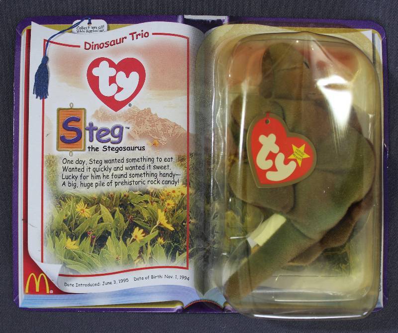 lot 9844 image: 2000 McDonalds Happy Meal Toys � Dinosaur Trio Steg Teenie Beanie. Original Pkg