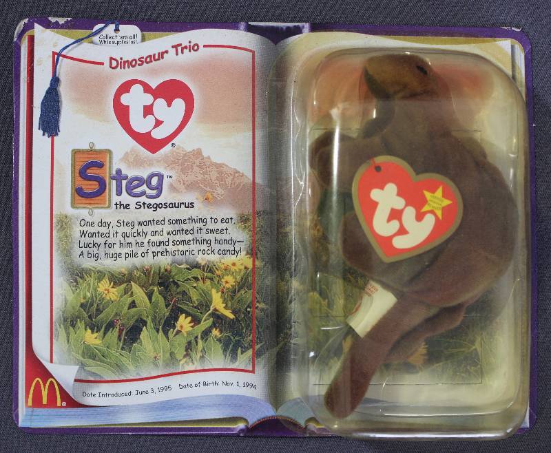 lot 9845 image: 2000 McDonalds Happy Meal Toys � Dinosaur Trio Steg Teenie Beanie. Original Pkg