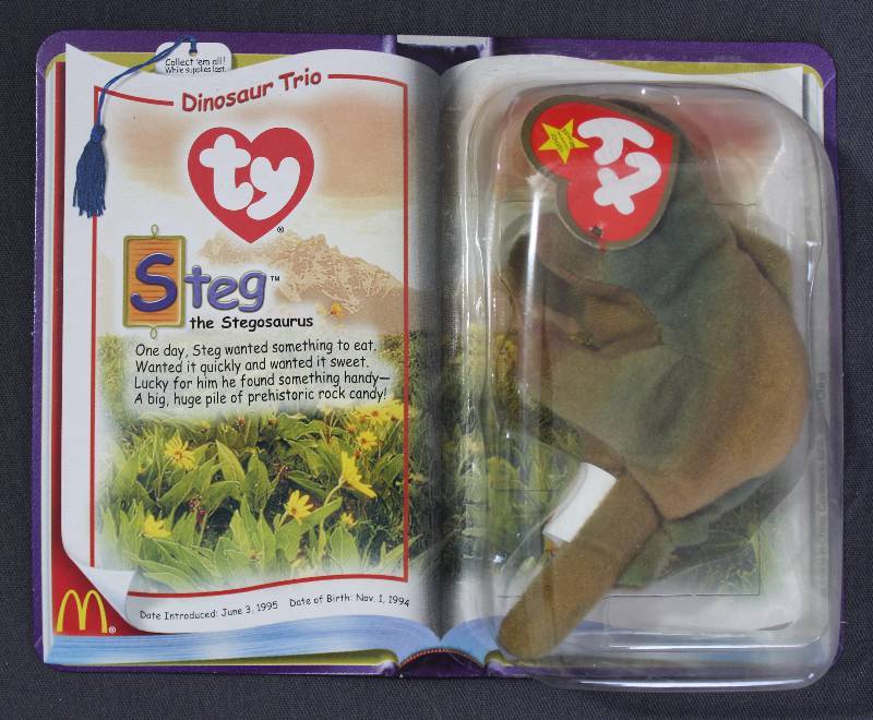 lot 9846 image: 2000 McDonalds Happy Meal Toys � Dinosaur Trio Steg Teenie Beanie. Original Pkg