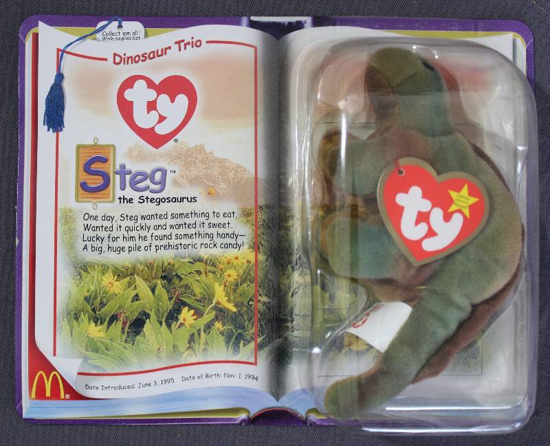 lot 9848 image: 2000 McDonalds Happy Meal Toys � Dinosaur Trio Steg Teenie Beanie. Original Pkg