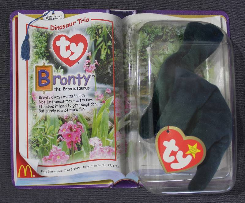 lot 9849 image: 2000 McDonalds Happy Meal Toys � Dinosaur Trio Bronty Teenie Beanie. Original Pkg