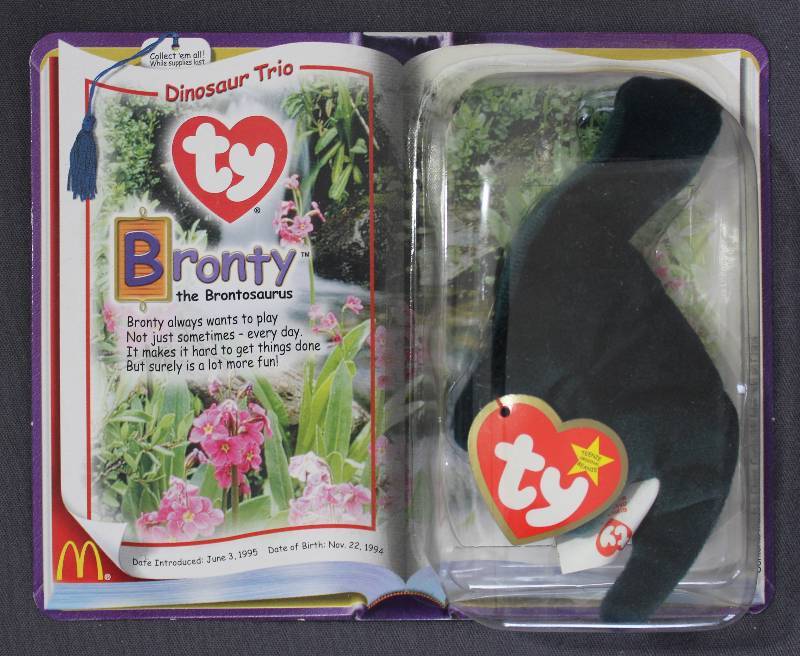 lot 9851 image: 2000 McDonalds Happy Meal Toys � Dinosaur Trio Bronty Teenie Beanie. Original Pkg