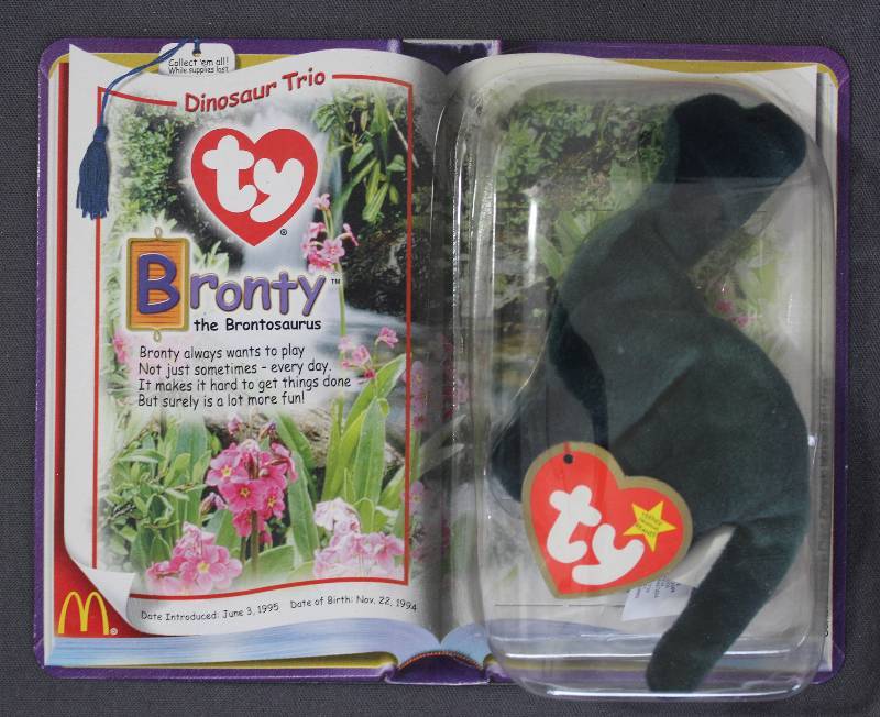lot 9853 image: 2000 McDonalds Happy Meal Toys � Dinosaur Trio Bronty Teenie Beanie. Original Pkg