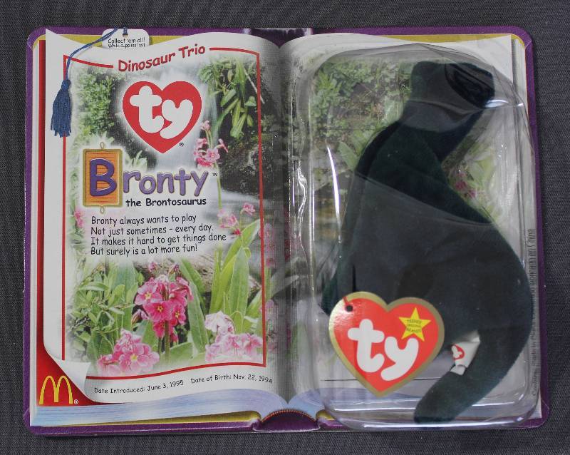lot 9854 image: 2000 McDonalds Happy Meal Toys � Dinosaur Trio Bronty Teenie Beanie. Original Pkg