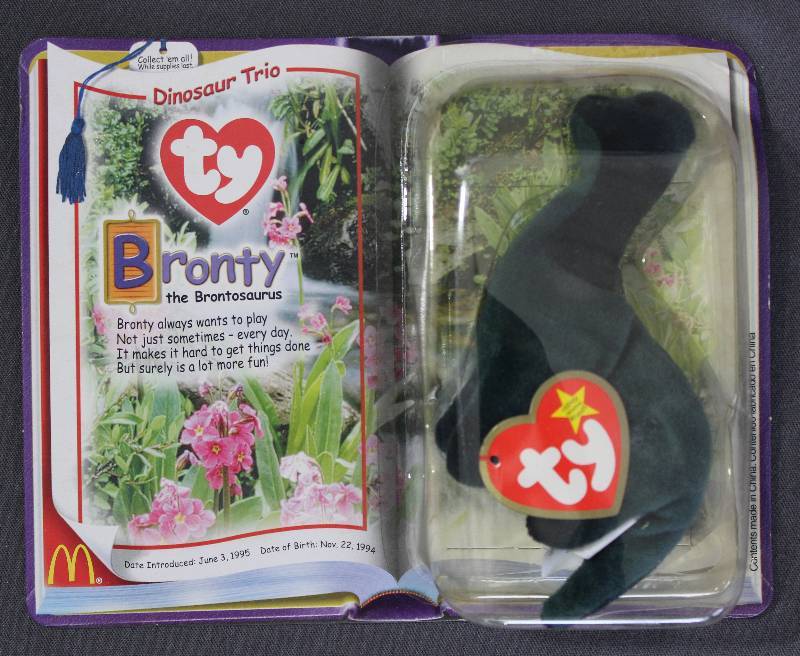 lot 9855 image: 2000 McDonalds Happy Meal Toys � Dinosaur Trio Bronty Teenie Beanie. Original Pkg