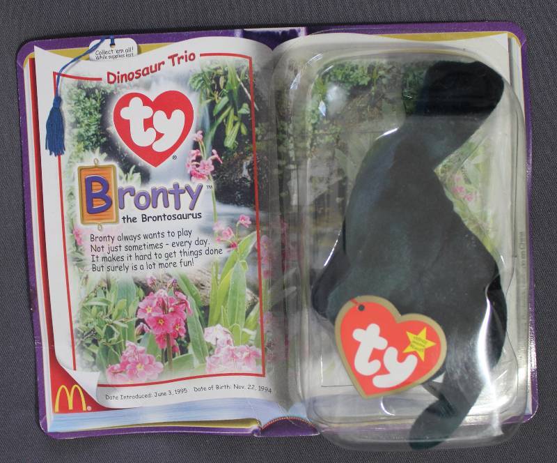 lot 9856 image: 2000 McDonalds Happy Meal Toys � Dinosaur Trio Bronty Teenie Beanie. Original Pkg