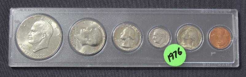 lot 9877 image: 1976 U.S. Coin Set - 1 Dollar, Half Dollar, Quarter, Dime, Nickel, and Penny with Case.
