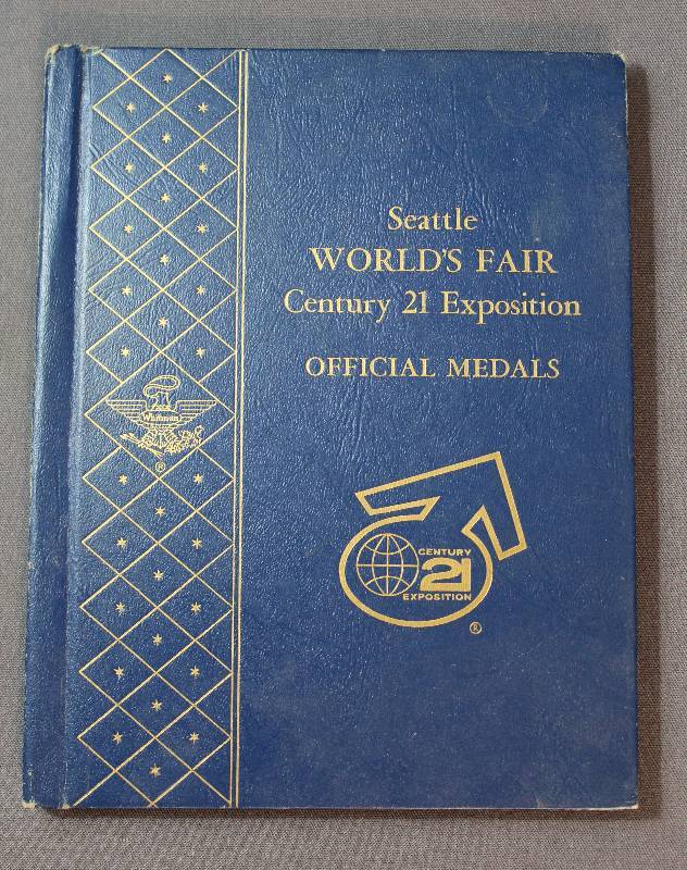 lot 9888 image: Seattle Worlds Fair Century 21 Exposition Official Medals Hardcover Book.