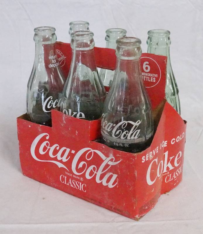 lot 4330 image: Six Pack of Coke Bottles Christmas Edition Box Coca-Cola