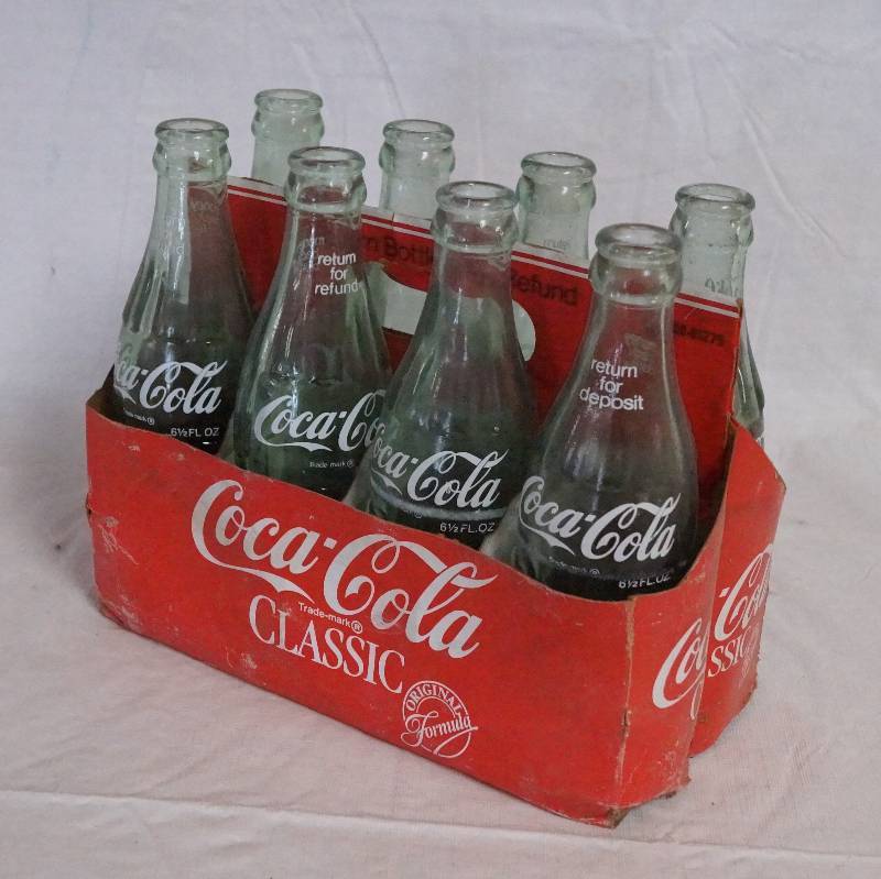lot 4331 image: Eight Pack of Coke Bottles with Carry Box Coca-Cola