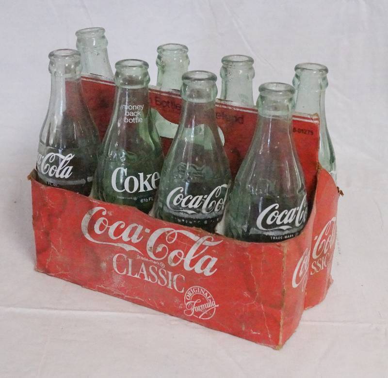 lot 4332 image: Eight Pack of Coke Bottles with Carry Box Coca-Cola