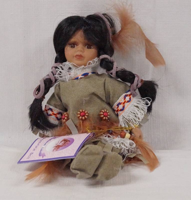 lot 6107 image: Goldenvale Collection - Native American Porcelain Doll w Beautiful Costume - w original Tag