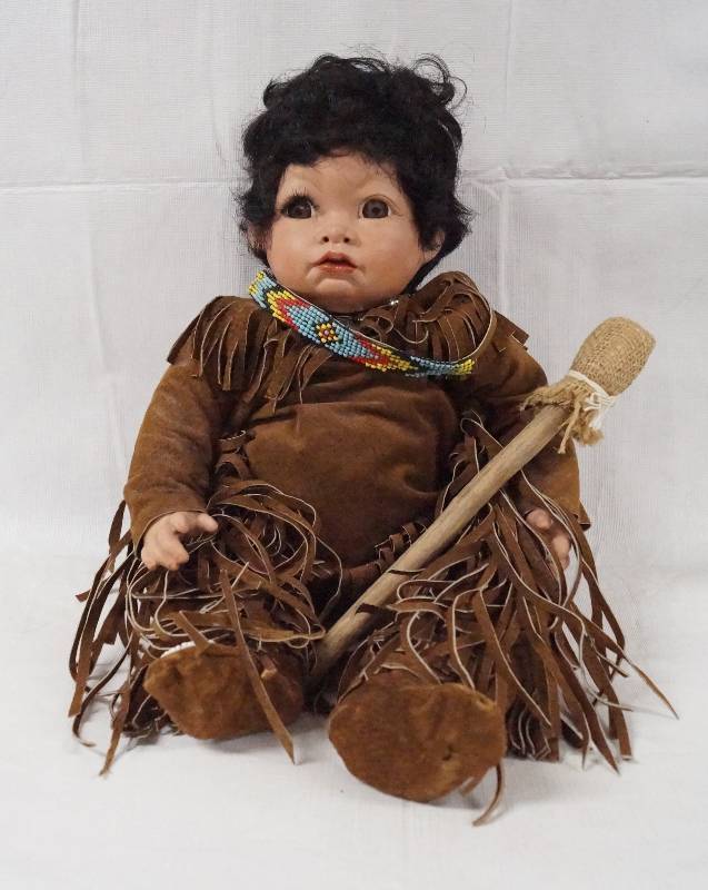 lot 6110 image: Native American Baby Doll w Drum Stick